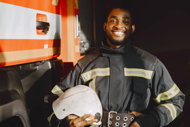istock Portrait of a firefighter standing in front of a fire engine 1315502663