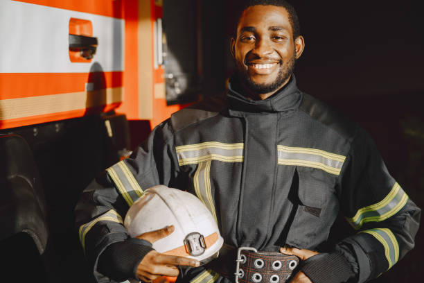 istock Portrait of a firefighter standing in front of a fire engine 1315502671