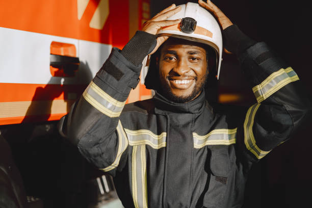 istock Portrait of a firefighter standing in front of a fire engine 1315502677