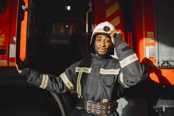 istock Portrait of a firefighter standing in front of a fire engine 1315502711
