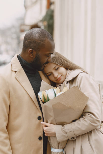 istock Mixed couple spenting time together in a spring city 1315503407