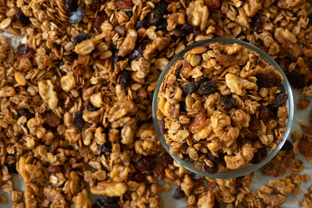 istock Granola cereal with oats, pumpkin seeds, walnuts, and raisins 1315505369