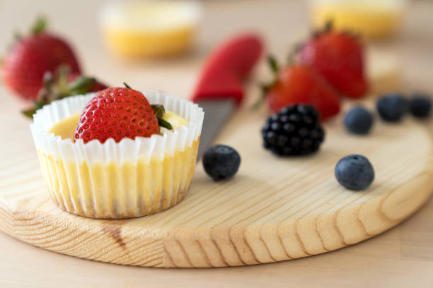 istock Mini cheesecake decorated with blueberry, blackberry and strawberry 1315505548
