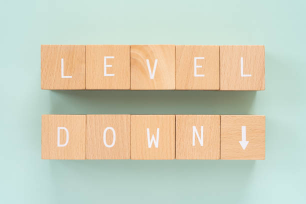 istock LEVEL DOWN; Wooden blocks with 