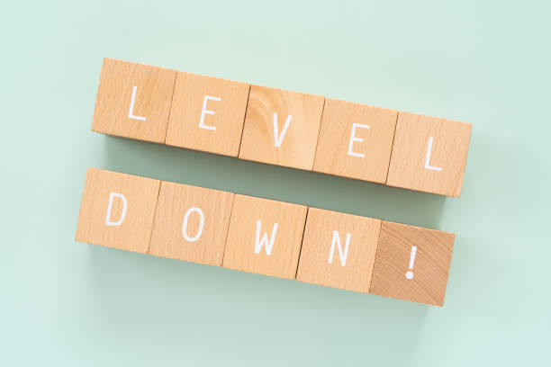 istock LEVEL DOWN; Wooden blocks with 