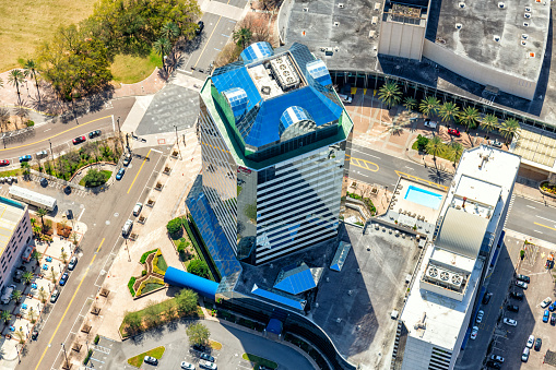 A generic office building from about 1000 feet overhead shot in the downtown district of Jacksonville, Florida.
