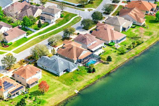 New suburban homes as part of a master planned community in the northern coastal Florida just outside of Jacksonville, Florida shot from an altitude of about 1000 feet overhead.