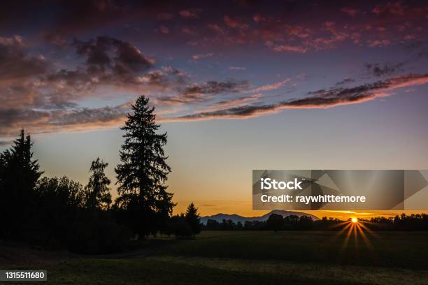 Marys Peak Sunburst Stock Photo - Download Image Now - Oregon - US State, Corvallis, Cloud - Sky