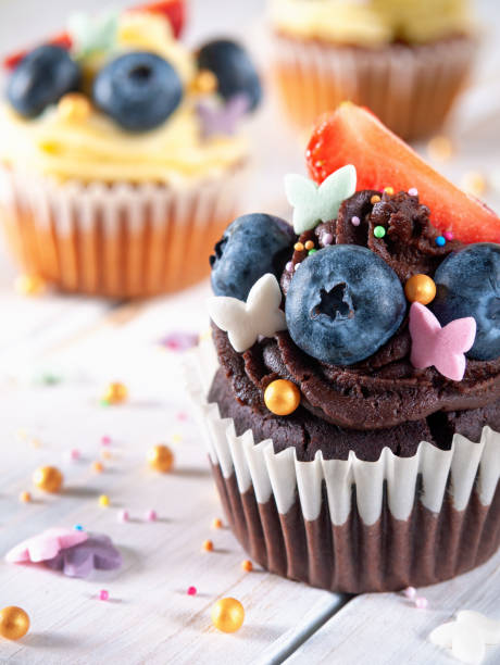 istock Chocolate and vanilla muffins with blueberry 1315512905