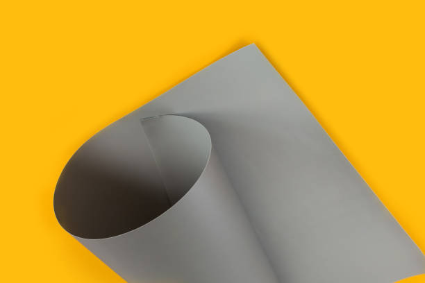 istock Grey and yellow craft cardboard folded in curls. 1315514051