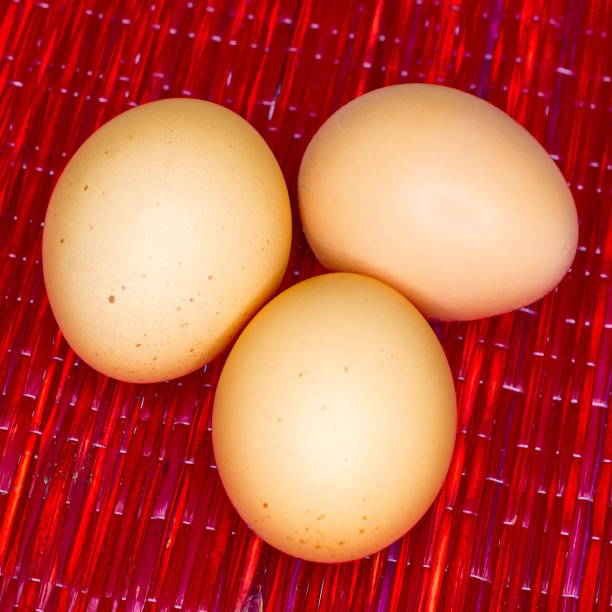 Three Eggs on Red stock photo