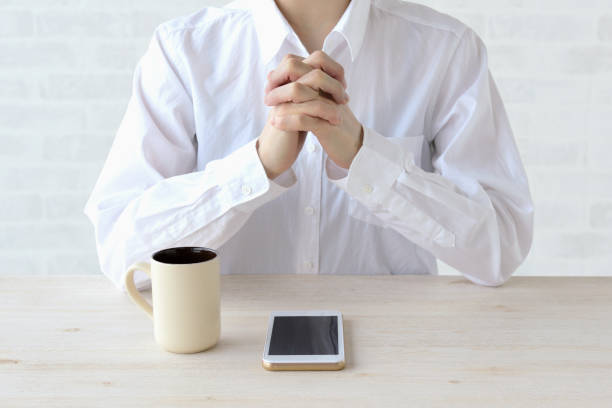 istock Womaon waiting for smartphone calling with hands crossed 1315519590
