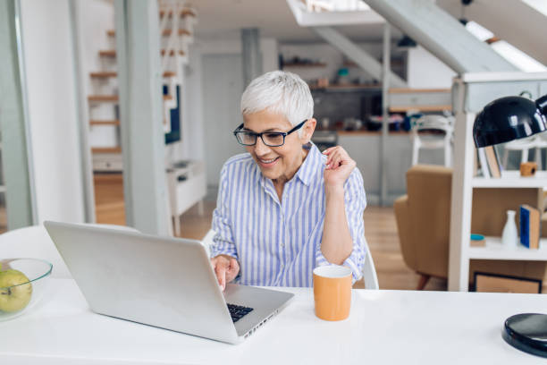 istock Mature woman freelancing from her home office 1315537154
