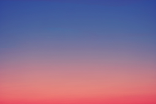 Gradient evening sky with colors from blue to red