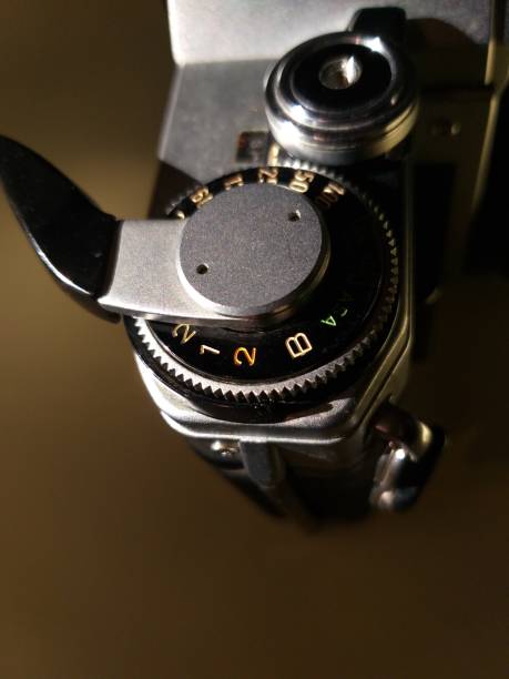 istock The camera body is located on a yellow background 1315539811