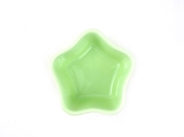 istock Top view, Empty green star-shape ceramic plate isolated on a white background. 1315544702