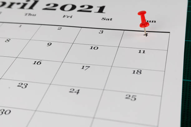 istock calendar for April with the First day ringed in pin 1315548665