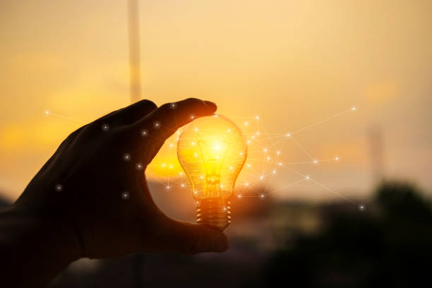 istock concept creativity with bulbs that shine glitter. 1315548697