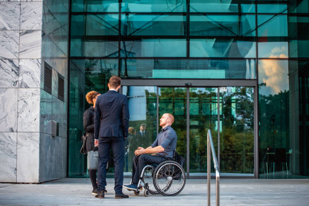 istock Diverse Business Colleagues Conversing at Building Entrance 1315555952