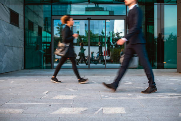 istock Mixed Race and Caucasian Corporate Workers on the Move 1315555961