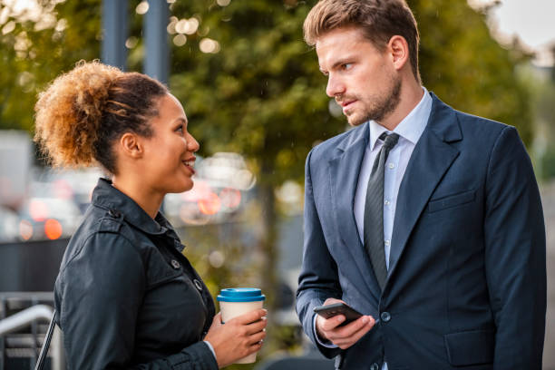 istock Business Partners Conversing Face to Face on Break 1315555974