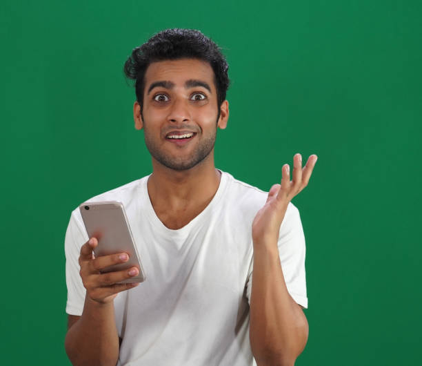 A man in surprise and Mobile in his hand