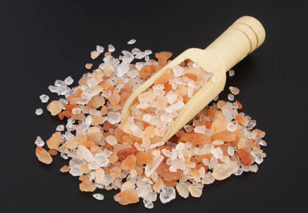istock Himalayan rock salt with scoop on black table 1315572207