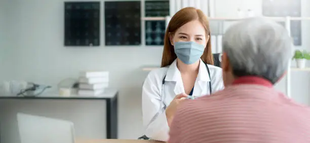 group of doctor and nurse wear protection mask checking and takecare infection people from covid-19 pandemic spread in clinic hospital background