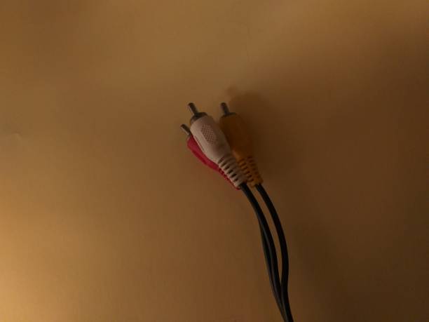 istock the power supply cable is placed on a yellow background 1315574215
