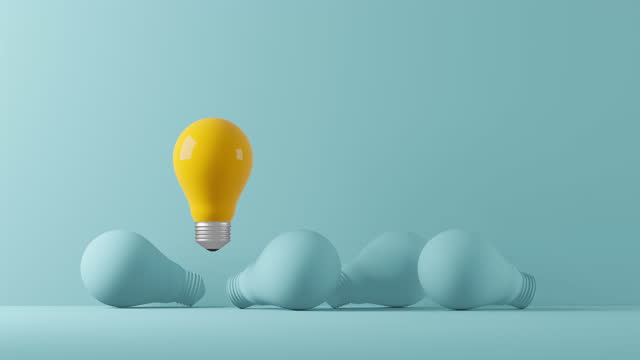 Light bulb yellow floating outstanding among lightbulb light blue on background. Concept of creative idea and innovation, Unique, Think different, Individual and standing out from the crowd. 3d animation