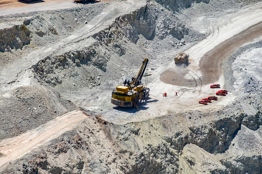 Big haul truck and machinery working in Chuquicamata, biggest open pit copper mine of the world, Calama, Chile