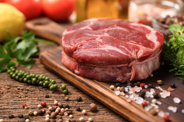 istock Fresh raw beef meat on a cutting board 1315594658