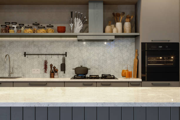 istock Modern Kitchen Interior With Empty Kitchen Island, Kitchen Counter, Oven, Stove And Kitchen Utensils At Night 1315600132