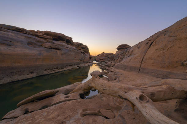 istock Sam Phan Bok, Ubon Ratchathani, Thailand. Dry rock reef in the Mekong River with mountain hills. Nature landscape background. Grand Canyon of Thailand. 1315602032