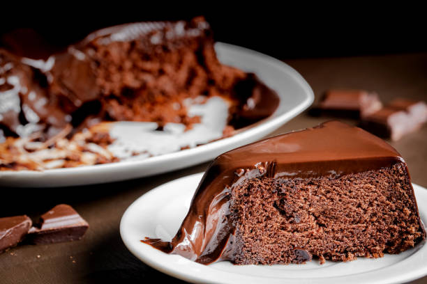 istock Chocolate cake slice in the white plate on the table. 1315606944