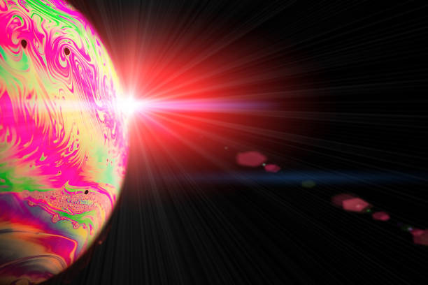istock Abstract background planet. Globe planet earth in galaxy universe space with sun on black background. Abstract colorful soap bubble. 1315607972