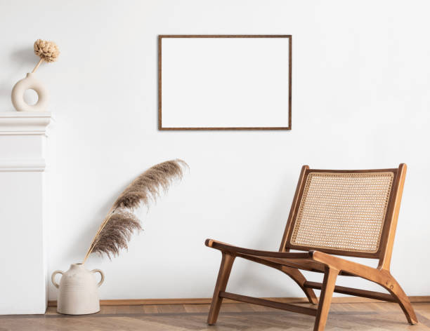 istock Blank picture frame mockup on a white wall. Artwork in interior design 1315616529