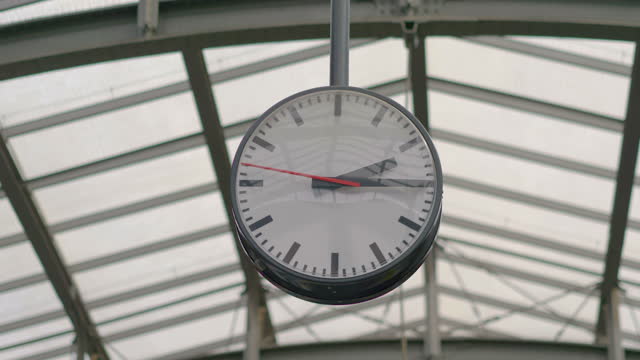 Public clock on the train station in 4k