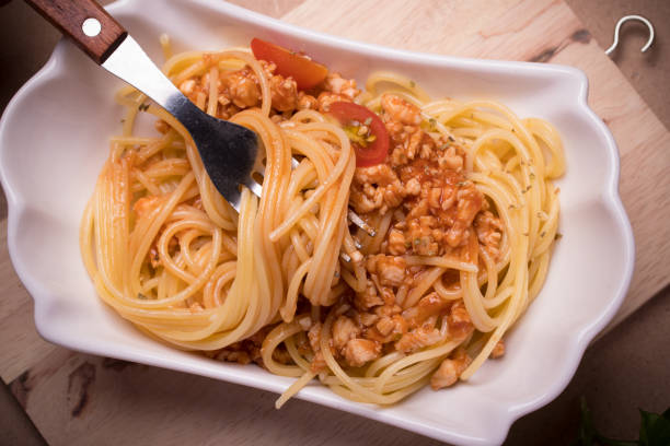 istock Spaghetti with Tomato Sauce in White Cups 1315621618