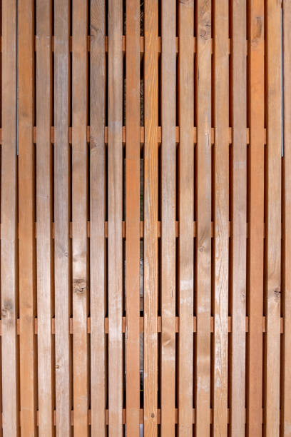 istock Light yellow wooden slats shield. 1315625816