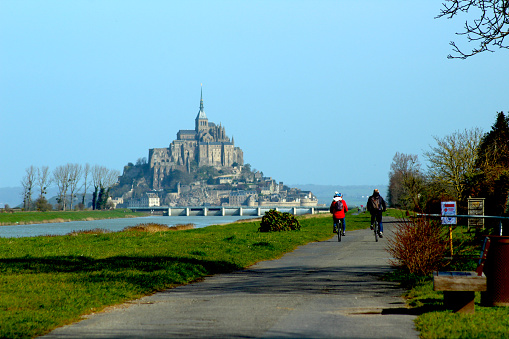 view of Mont Saint Michel in sunny weather during low tide, Normandy, France, March 2021
