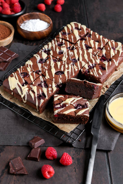 istock Homemade Chocolate Brownies with Raspberries 1315645095