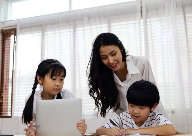 istock Happiness two children learning on smart phone at home in holiday weekend. 1315646826