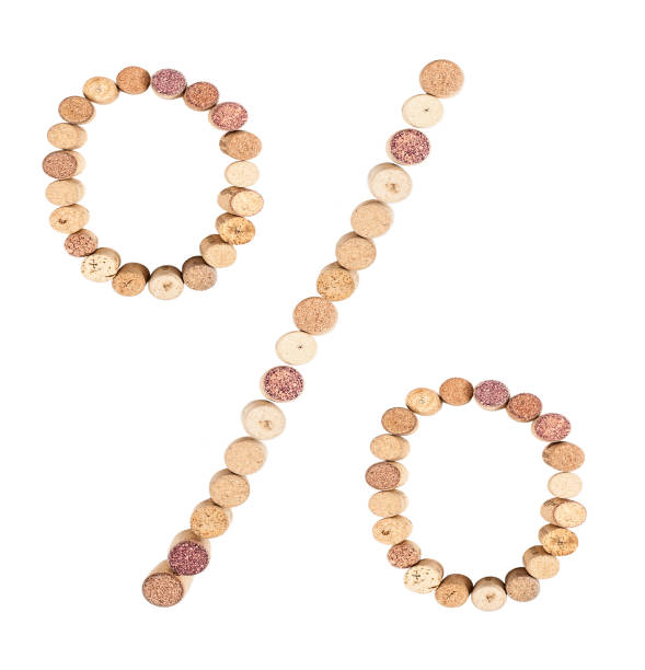 istock Percentage sign is made from wine corks, close-up. Isolated on white background 1315650131