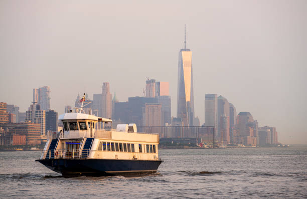 Waterway ferry transports passengers from Manhattan to New Jersey Waterway ferry transports passengers from Manhattan to New Jersey across Hudson River, New York, USA hudson stock pictures, royalty-free photos & images