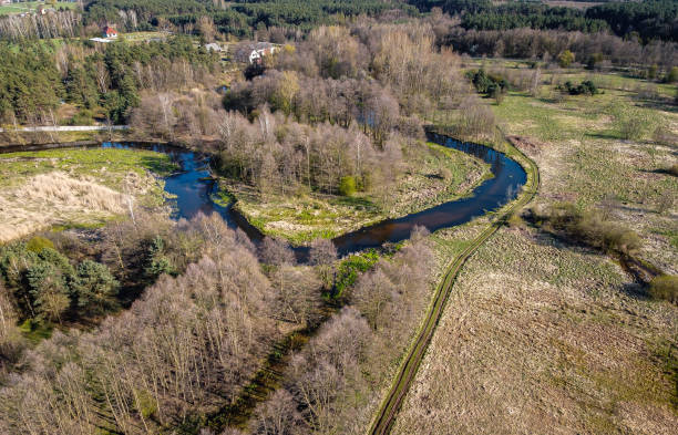istock Low flight over the small Grabia River, Poland. 1315650998