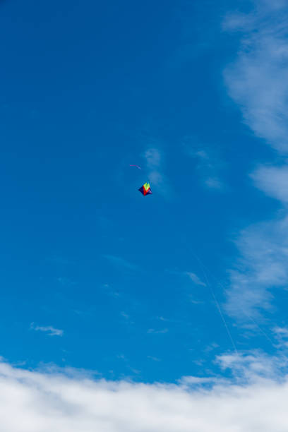 istock Colorful Kites flying over the sky 1315653989