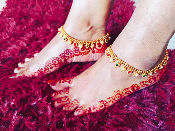 istock A feet with henna art and Anklet 1315656581