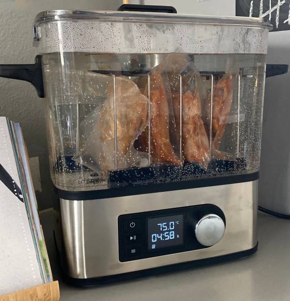 Sous Vide Cooking Cooking by Spareribs and Cookbook stock photo