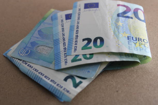 twenty euros paper currency european union currency - european union coin european union currency coin isolated objects imagens e fotografias de stock